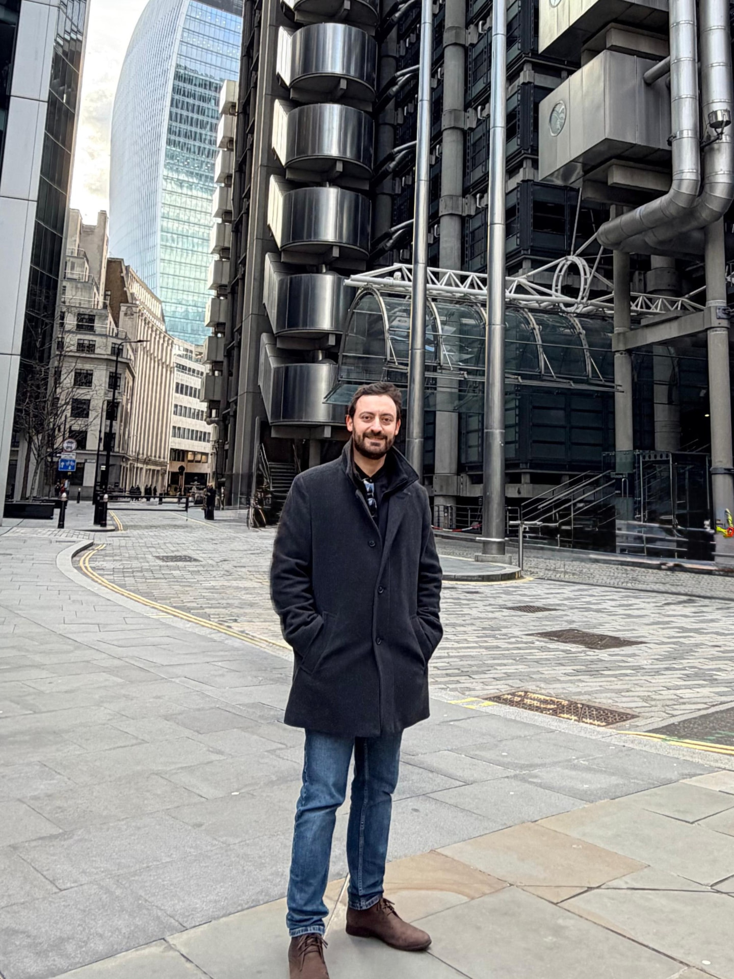Rafael Neves Machado in the City of London, beside the Lloyd's building